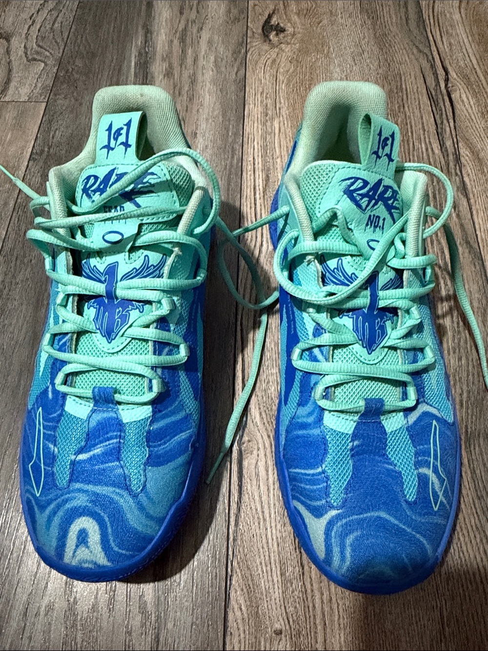 Puma Melo Blue and Mint Athletic Sneakers